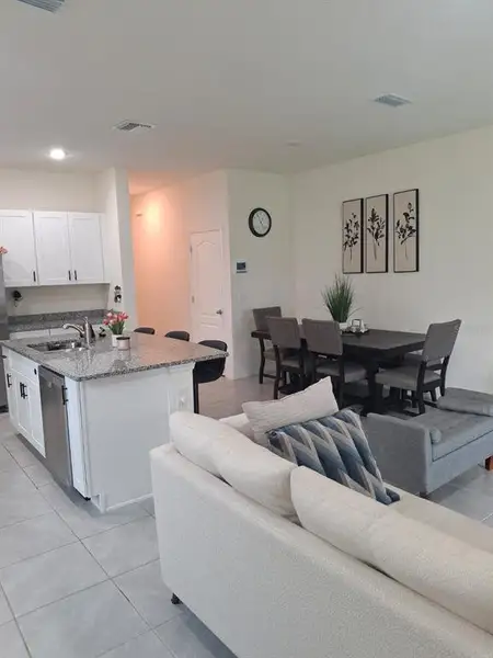 Furnished interior view inside a new home in , Kissimmee (Image 4). Furnished interior view inside a new home in , Kissimmee (Image 4).