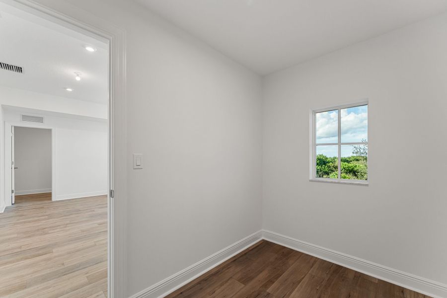 Representative unfurnished interior of a home built from the Zinnia by Mattamy Homes in Newfield - Rosette Park, Palm City (Image 18).