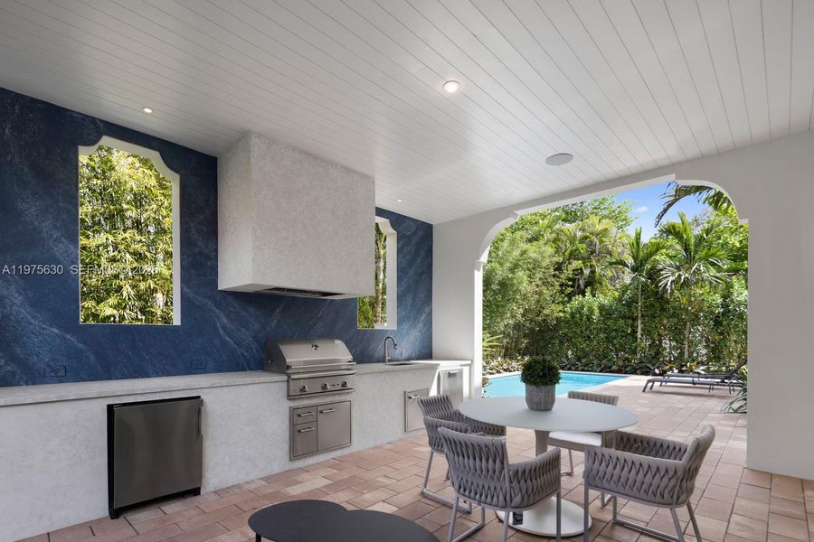 Exterior details and patio area of a home in , Coral Gables (Image 30).