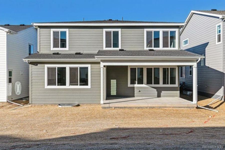 Exterior details and patio area of a home in Floret Collection at Alder Creek, Parker (Image 3).