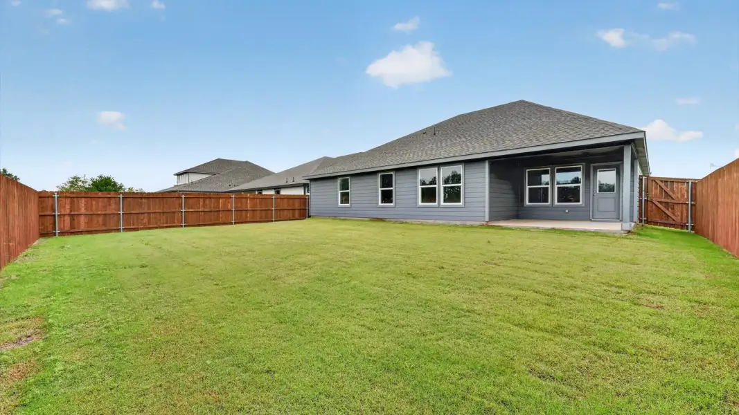 Exterior details and patio area of a home in Parkerville Meadows, DeSoto (Image 2).