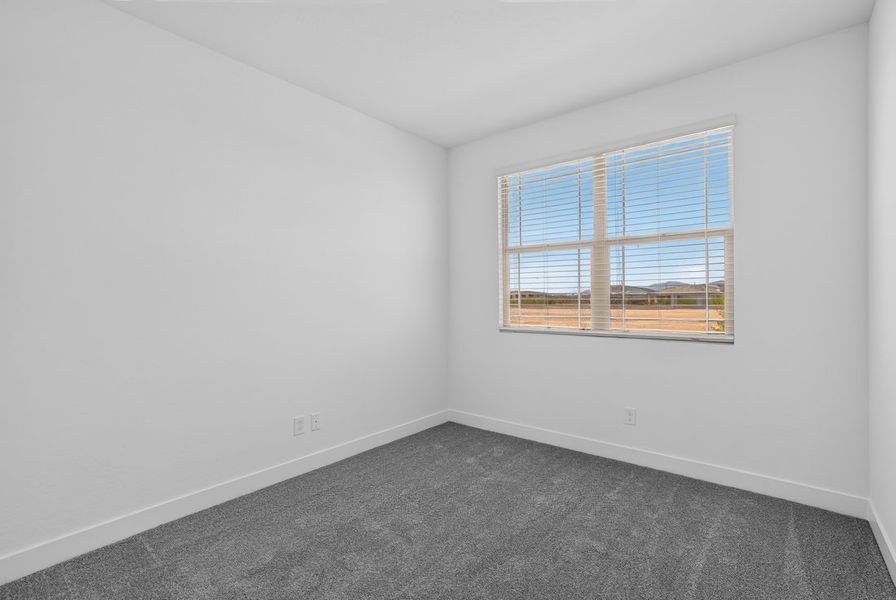 Spacious, unfurnished interior of a new home in Artisan at Asante, Surprise (Image 21).
