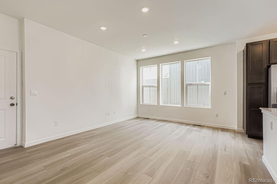 Spacious, unfurnished interior of a new home in Sky Ranch: Parkside Collection, Watkins (Image 8).