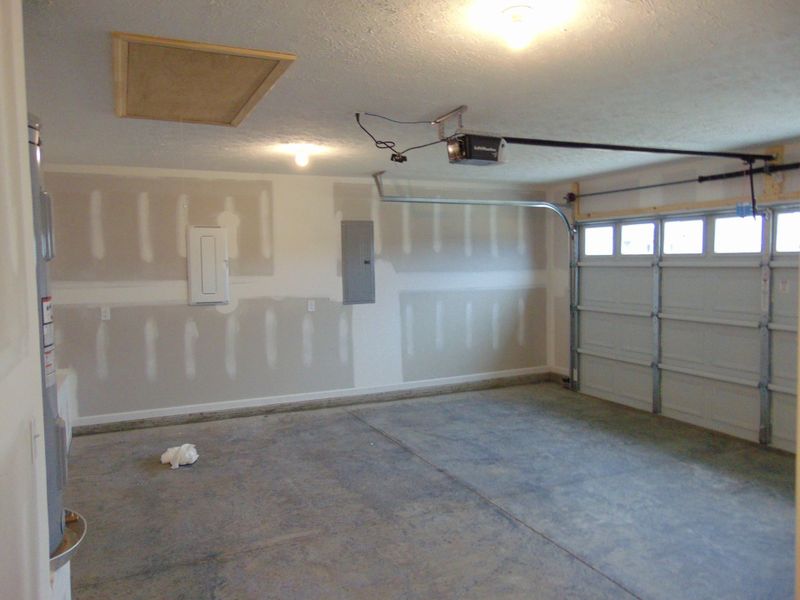 Garage with Door Opener. File Photo Garage with Door Opener. File Photo