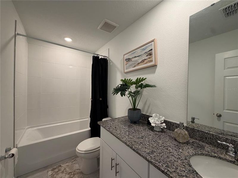 Furnished interior view inside a new home in Lake Deer Estates - Signature Series, Poinciana (Image 11).