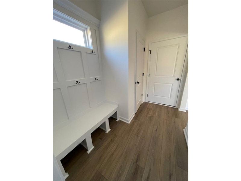 This inviting mudroom features practical built-in