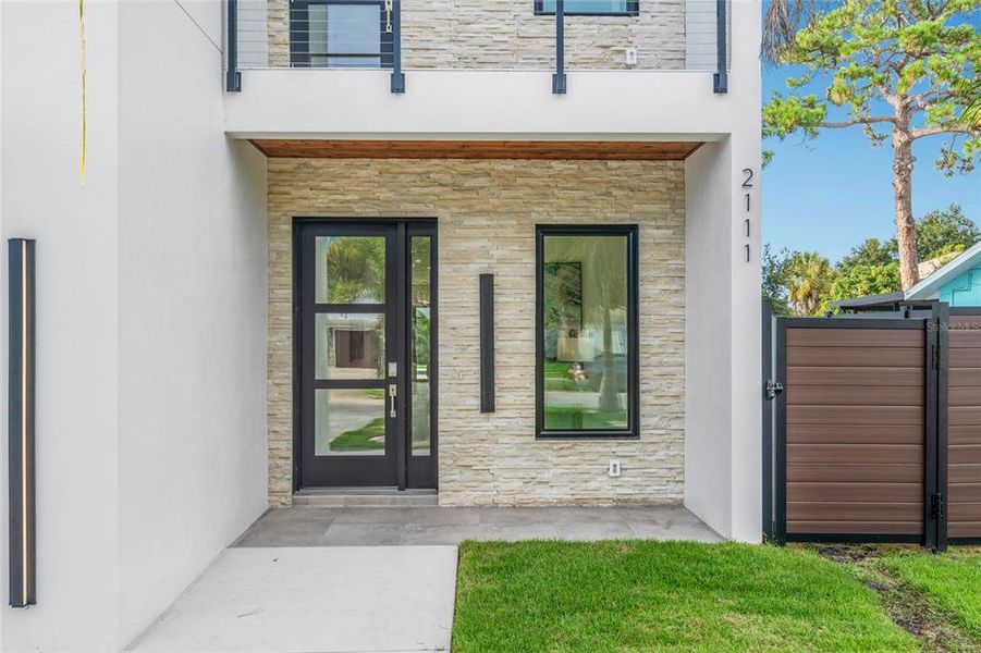 Front exterior of a new home in , Sarasota, FL, highlighting curb appeal (Image 1). Front exterior of a new home in , Sarasota, FL, highlighting curb appeal (Image 1).