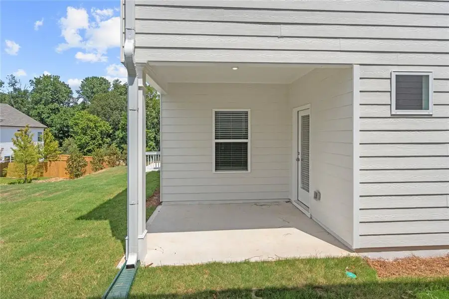 Exterior details and patio area of a home in The Andros, Dalton (Image 3).