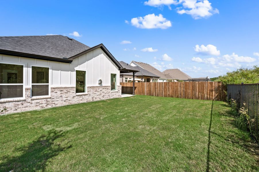 Exterior details and patio area of a home in Parks of Aledo, Aledo (Image 29).