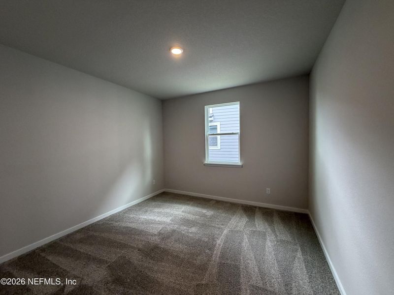 Spacious, unfurnished interior of a new home in Reserve East, Flagler Beach (Image 44).
