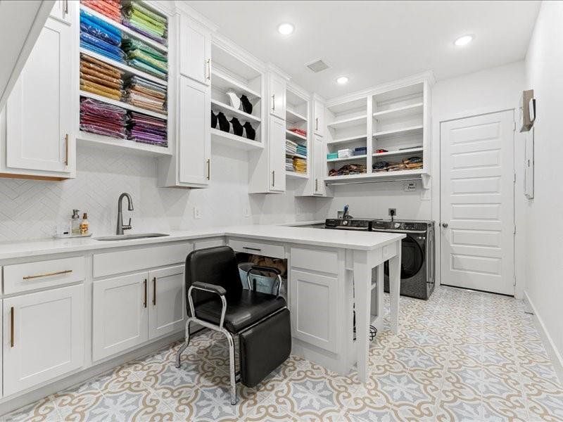 Check out this enhanced spacious laundry room with the enhanced backsplash Check out this enhanced spacious laundry room with the enhanced backsplash