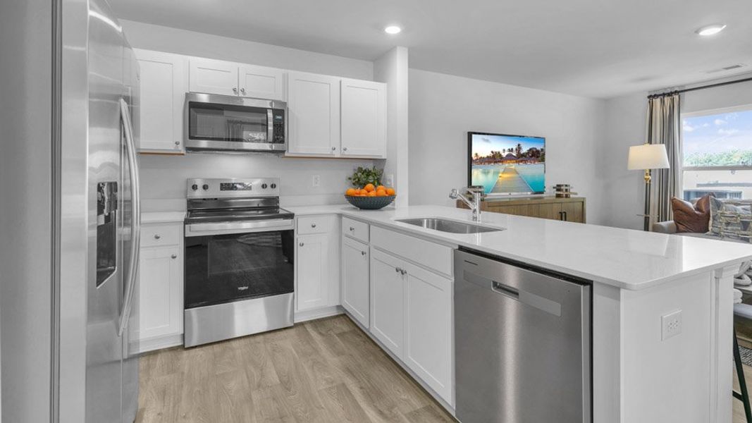 Furnished interior view inside a new home in The Townes at Hunter Hill, Rocky Mount (Image 5).