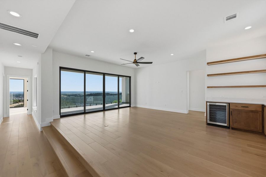 Accesses a covered patio with hill country views!