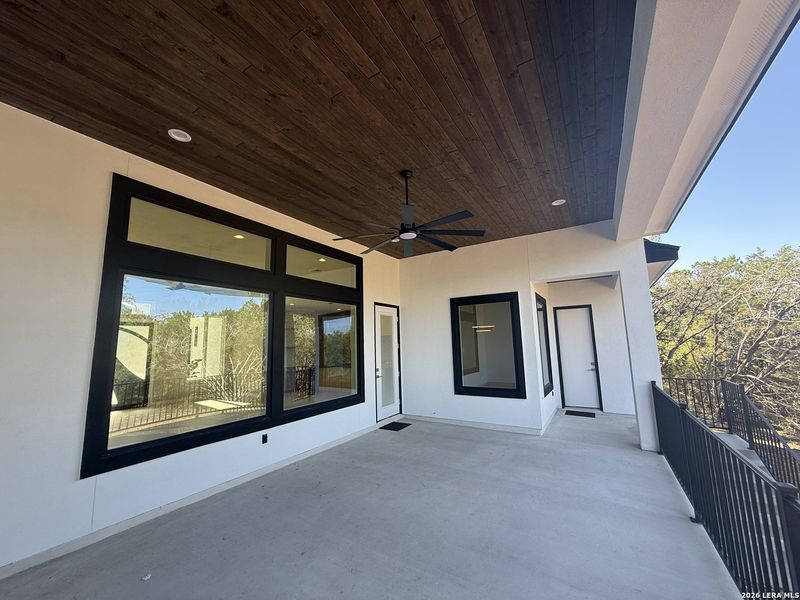 Exterior details and patio area of a home in , Spring Branch (Image 30).