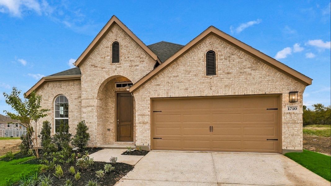 Front exterior of a new home in Thompson Farms, Van Alstyne, TX, highlighting curb appeal (Image 23). Front exterior of a new home in Thompson Farms, Van Alstyne, TX, highlighting curb appeal (Image 23).