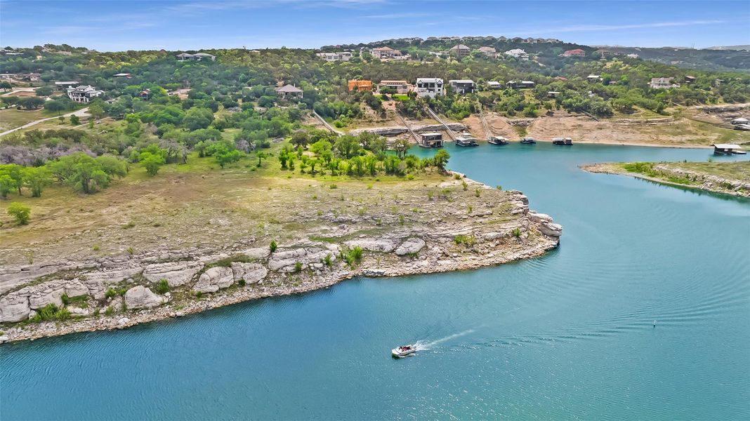 This property enjoys a uniquely private harbor with deep, year-round water ranging from 35 to 80 feet—ideal for boating, swimming, paddleboarding, and tranquil lakeside living.