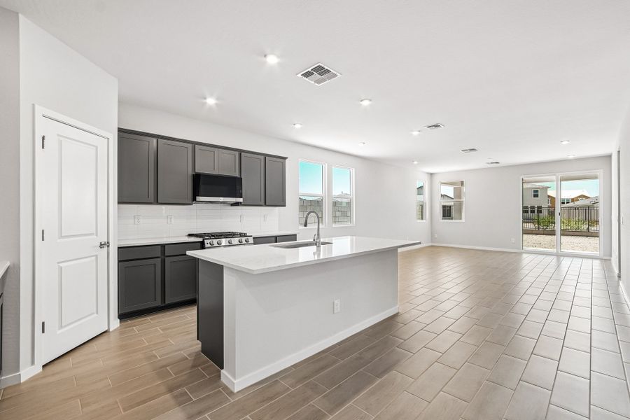 A kitchen with a large island.