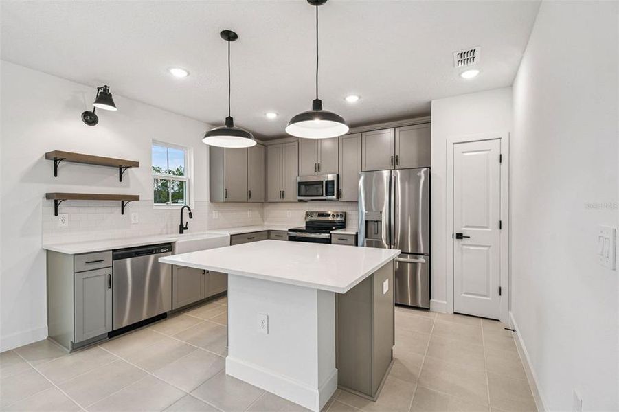 Furnished interior view inside a new home in Aspire at Canter Creek, Davenport (Image 12).