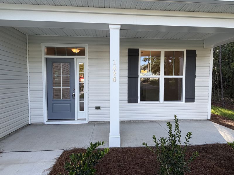 Exterior details and patio area of a home in Parkwood Estates, Leland (Image 2).
