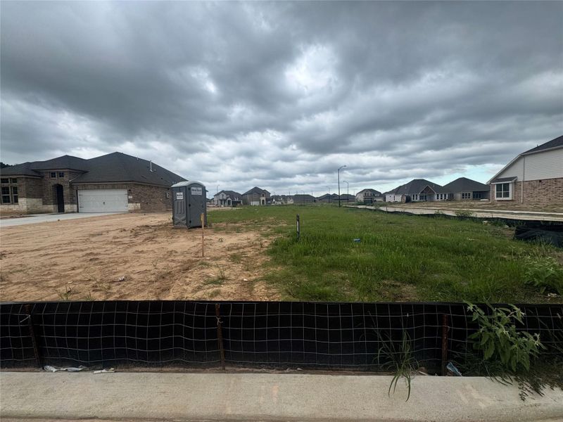 Front exterior of a new home in Katy Lakes 50FT, Katy, TX, highlighting curb appeal (Image 24). Front exterior of a new home in Katy Lakes 50FT, Katy, TX, highlighting curb appeal (Image 24).