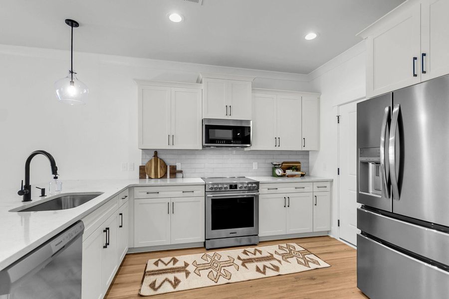 Furnished interior view inside a new home in , North Charleston (Image 9).
