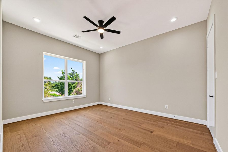 Secondary Bedroom featuring spacious layout and sleek, carpet-free flooring. Secondary Bedroom featuring spacious layout and sleek, carpet-free flooring.