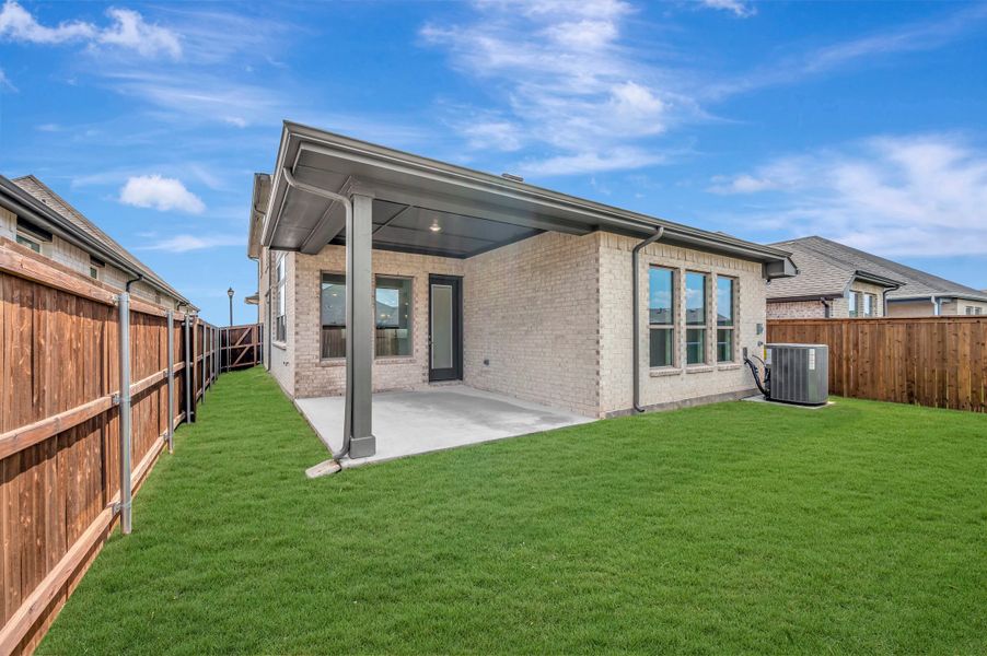 Exterior details and patio area of a home in Creekshaw – Gardens, Royse City (Image 3). Exterior details and patio area of a home in Creekshaw – Gardens, Royse City (Image 3).