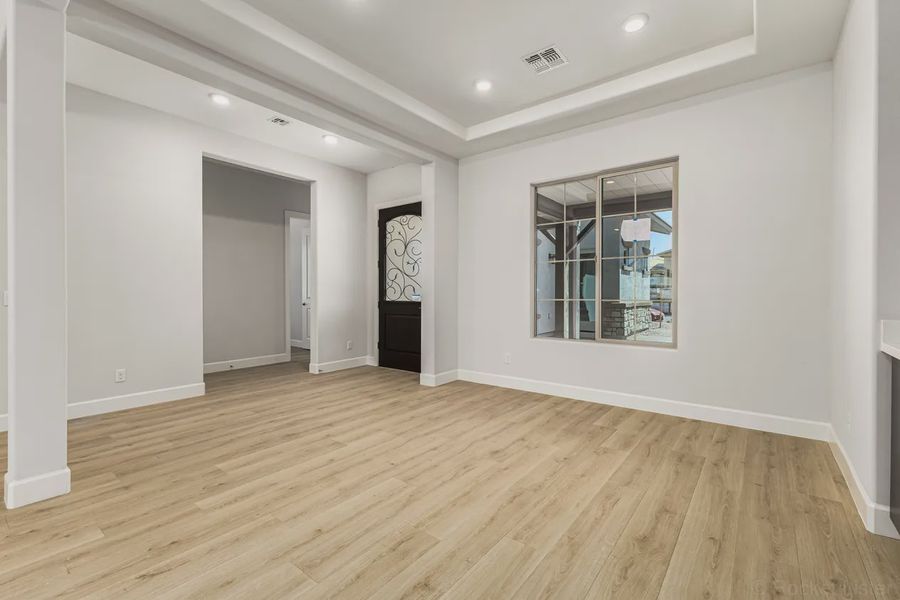 Spacious, unfurnished interior of a new home in Bellero Estates, Queen Creek (Image 14).