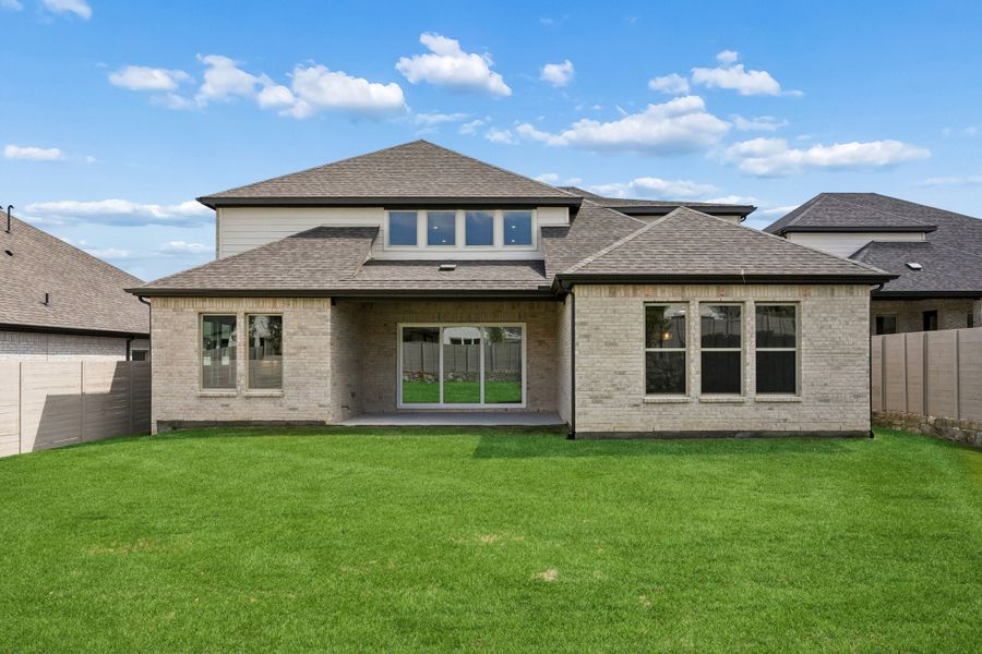 Exterior details and patio area of a home in Painted Tree Lakeside, McKinney (Image 25).