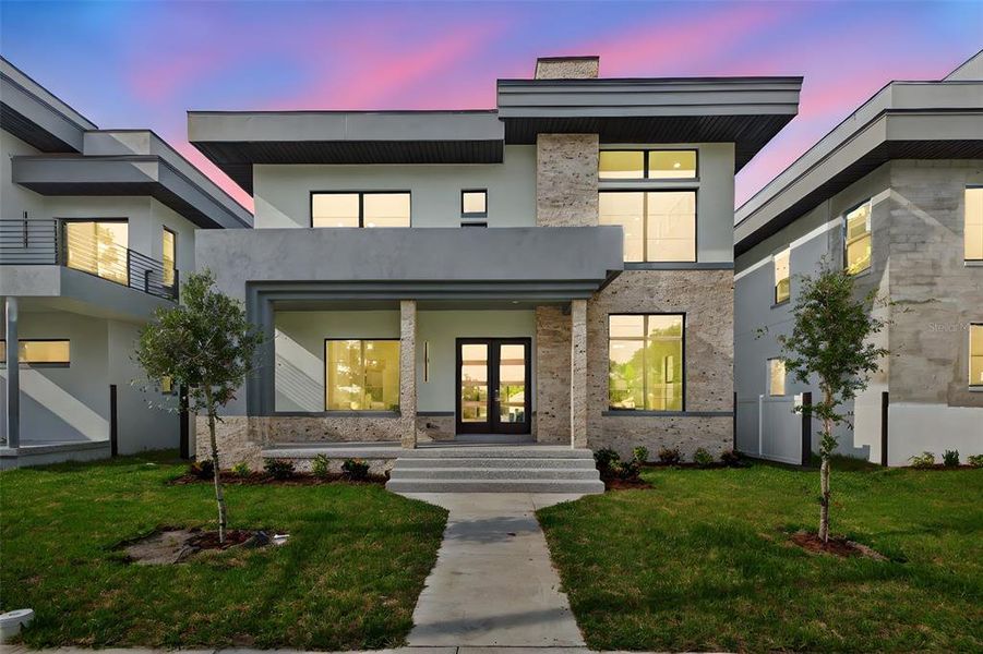 Front exterior of a new home in , St. Petersburg, FL, highlighting curb appeal (Image 22). Front exterior of a new home in , St. Petersburg, FL, highlighting curb appeal (Image 22).