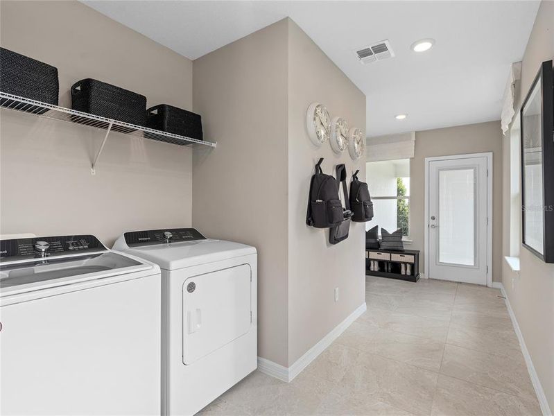 Furnished interior view inside a new home in EverBe, Orlando (Image 17).