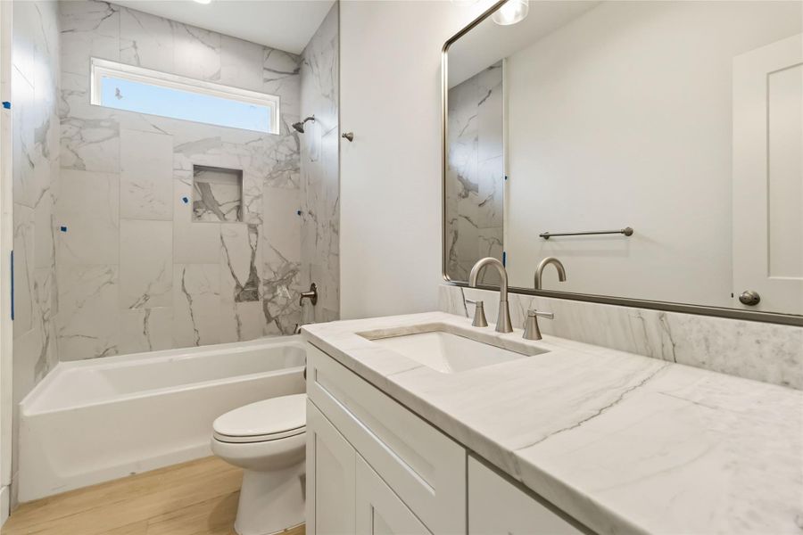 2nd full bathroom with custom tiling