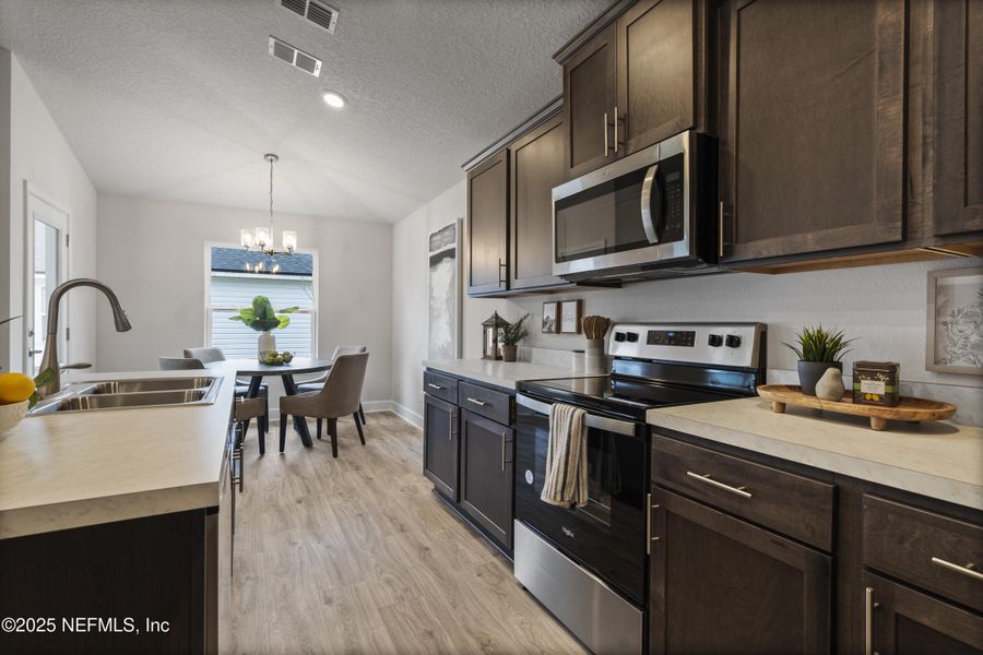 Furnished interior view inside a new home in Summerglen, Jacksonville (Image 6).