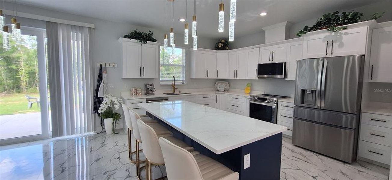 Furnished interior view inside a new home in , Webster (Image 12).