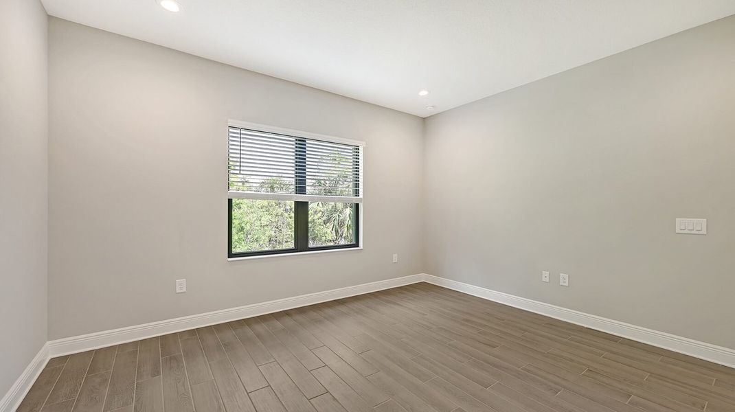 Spacious, unfurnished interior of a new home in Boca Royale Golf and Country Club at Wellen Park, Englewood (Image 29).
