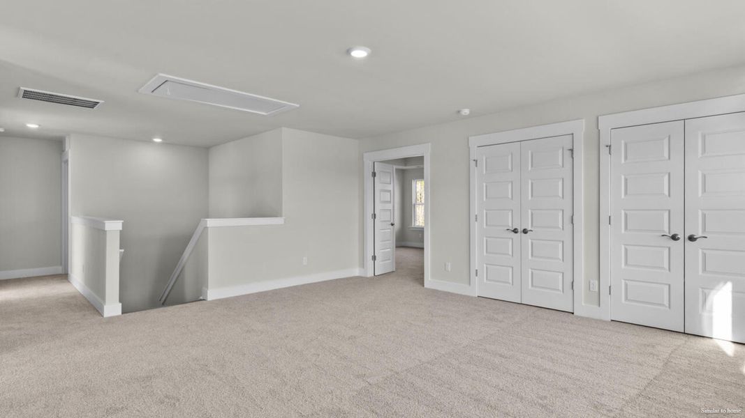 Spacious, unfurnished interior of a new home in The Haven at Indigo Preserve, Leland (Image 34).