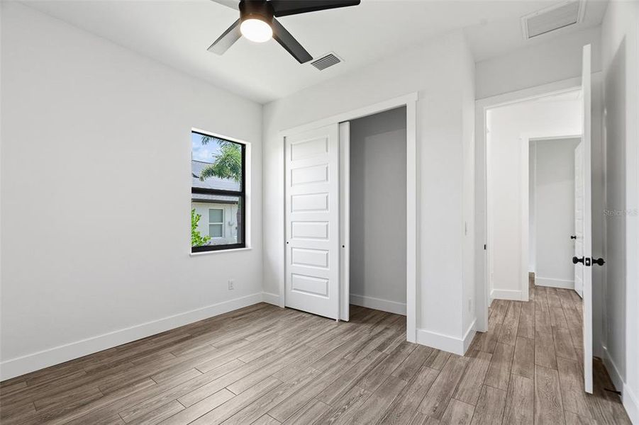 Spacious, unfurnished interior of a new home in , Port Charlotte (Image 17).