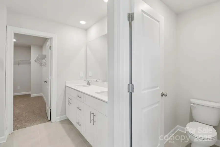 Photo is not of the actual home, but is an inspirational photo of builder’s model home and may depict options, furnishings, and/or decorator features that are not included