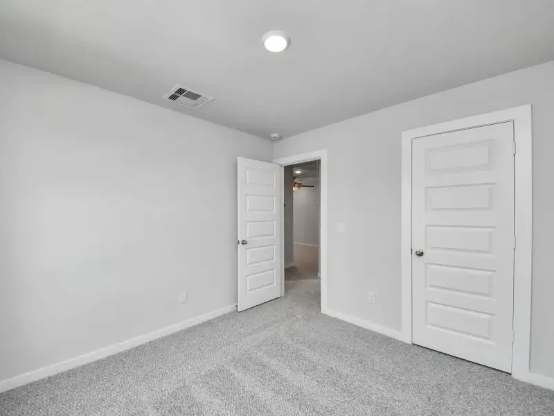Spacious, unfurnished interior of a new home in Windmill Estates, Magnolia (Image 32).