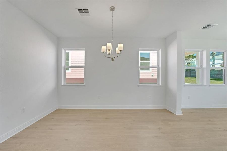 Spacious, unfurnished interior of a new home in Green Key Village, Lady Lake (Image 33).