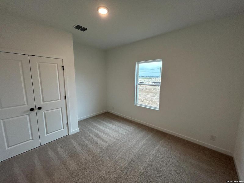 Spacious, unfurnished interior of a new home in Hennersby Hollow, San Antonio (Image 26).