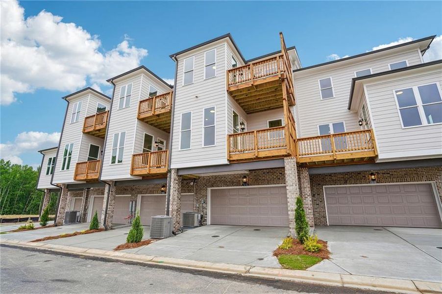 Front exterior of a new home in Waterhaven, Cumming, GA, highlighting curb appeal (Image 24).