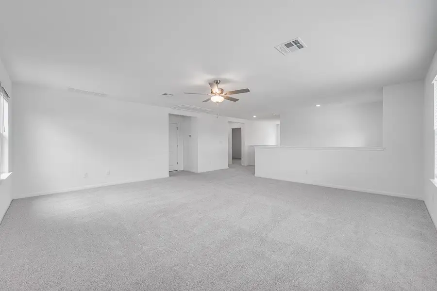Representative unfurnished interior of a home built from the Wren by Taylor Morrison in Emory Crossing 50s, Hutto (Image 14).