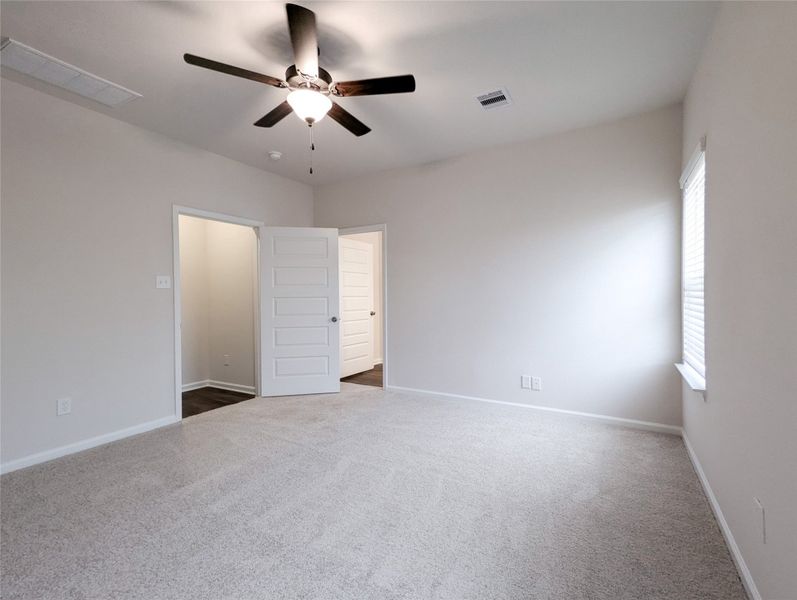 Master bedroom with ensuite bath and walk-in closet