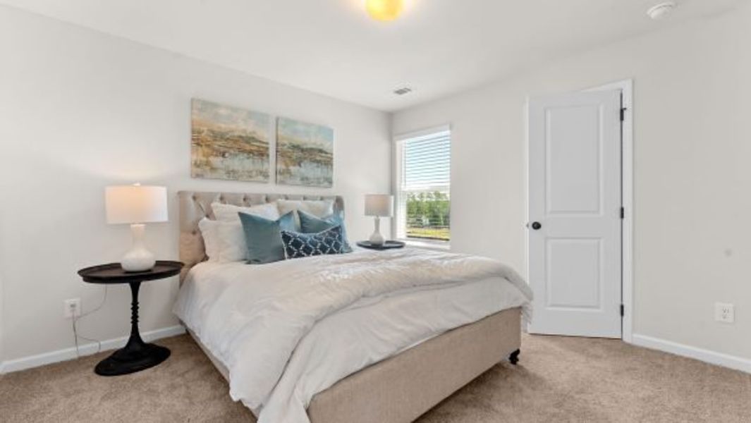 Representative furnished interior of a home built from the Kinsley by Piedmont Residential in Magnolia Trace, Flowery Branch (Image 13).