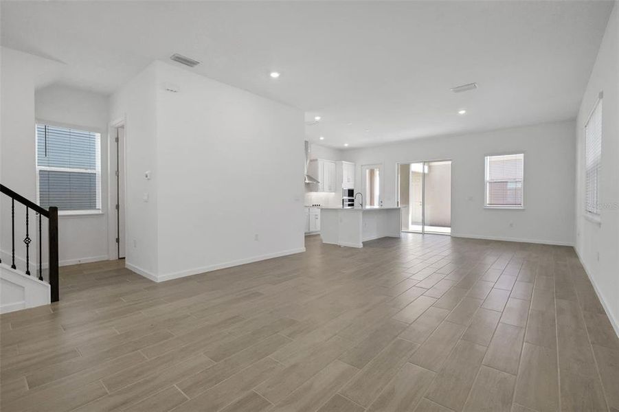 Spacious, unfurnished interior of a new home in Serenade at Ovation, Winter Garden (Image 16).