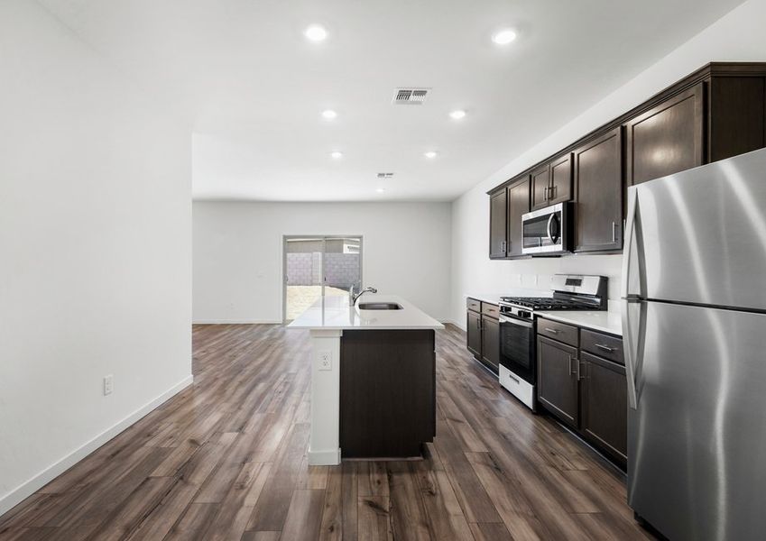 The kitchen comes with a full suite of energy-efficient appliances!