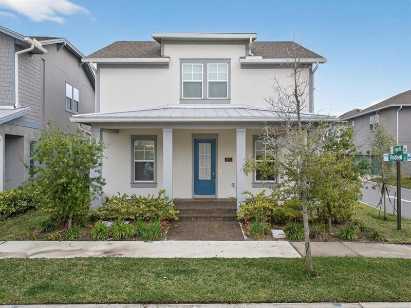 Front exterior of a new home in , Orlando, FL, highlighting curb appeal (Image 1). Front exterior of a new home in , Orlando, FL, highlighting curb appeal (Image 1).