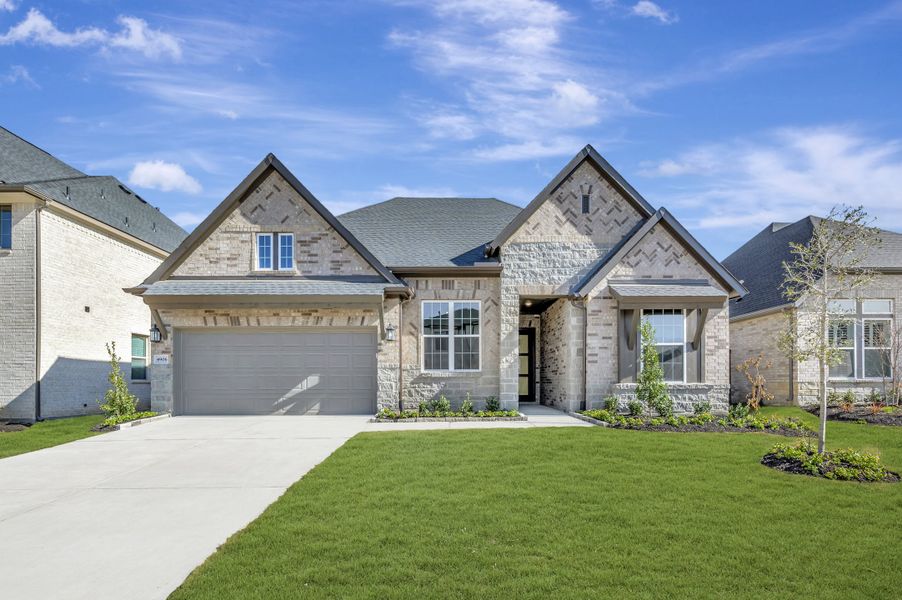 Front exterior of a new home in Brookewater - Ascent Collection, Rosenberg, TX, highlighting curb appeal (Image 23). Front exterior of a new home in Brookewater - Ascent Collection, Rosenberg, TX, highlighting curb appeal (Image 23).