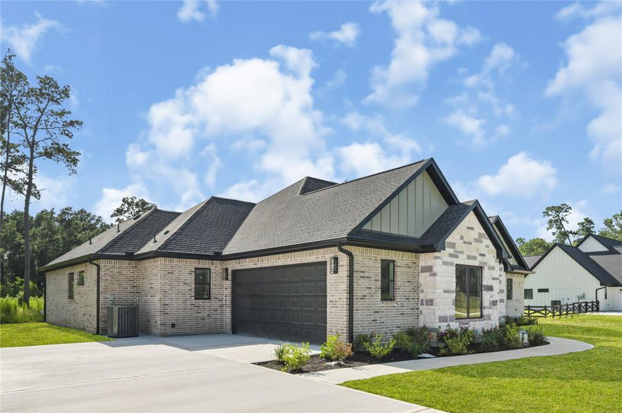Front exterior of a new home in , Conroe, TX, highlighting curb appeal (Image 26). Front exterior of a new home in , Conroe, TX, highlighting curb appeal (Image 26).